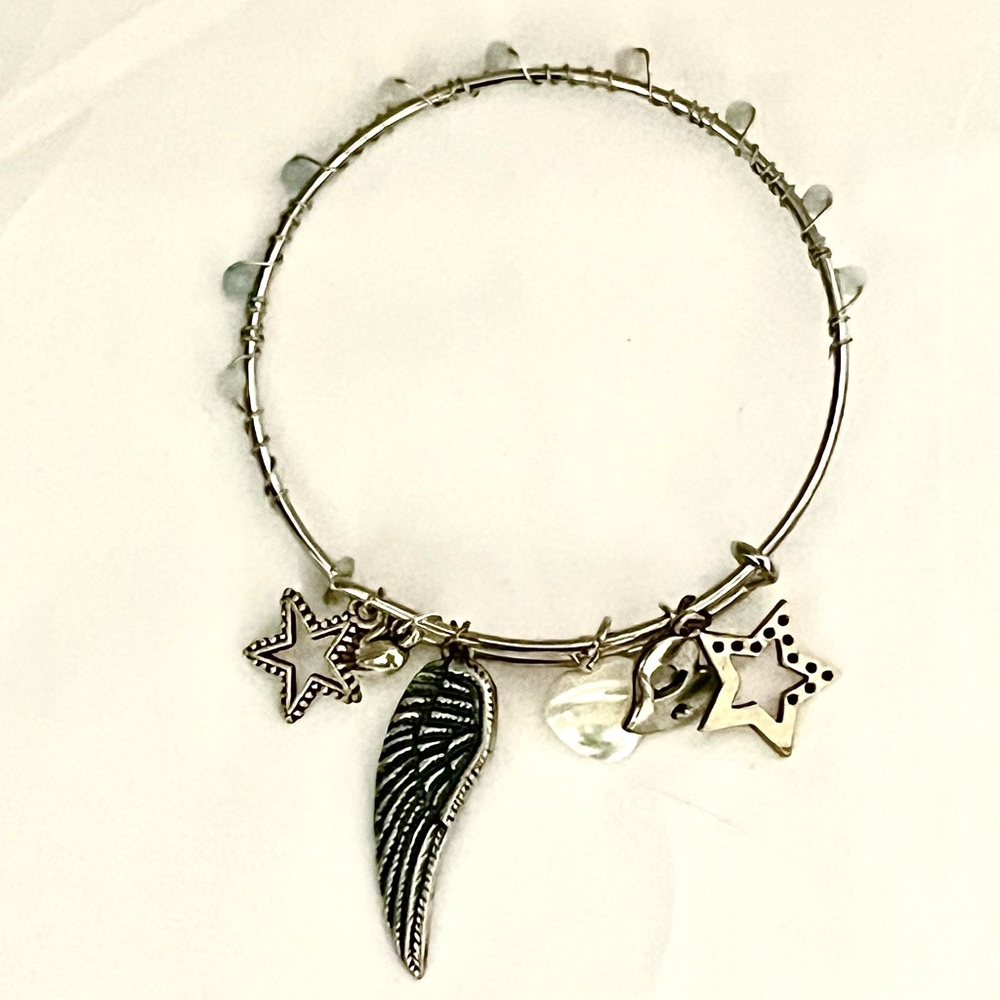Hand Crafted Silver Star and Wing Bracelet